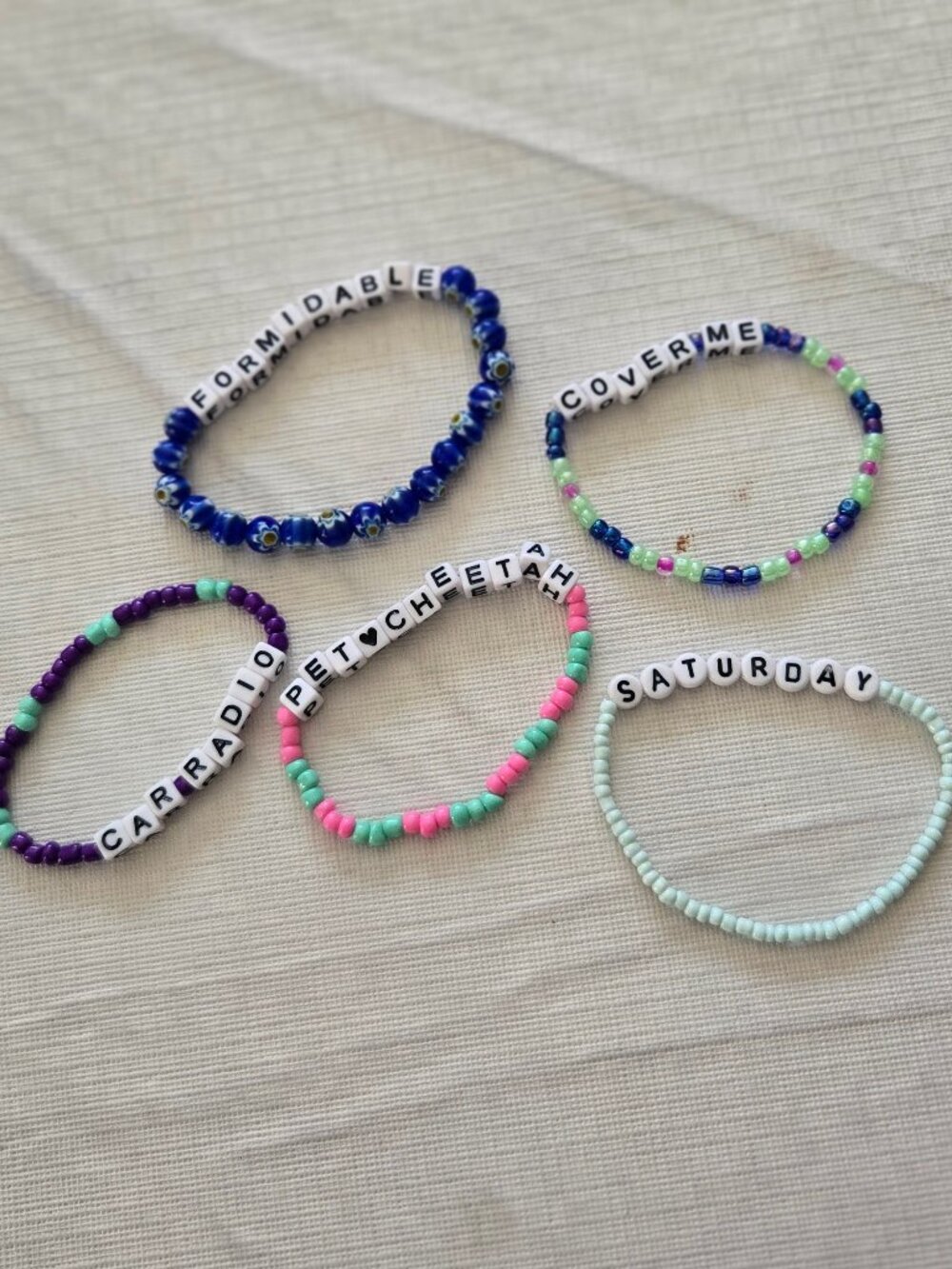 Handmade Twenty One Pilots seed beaded bracelets, set of 5 ($57)